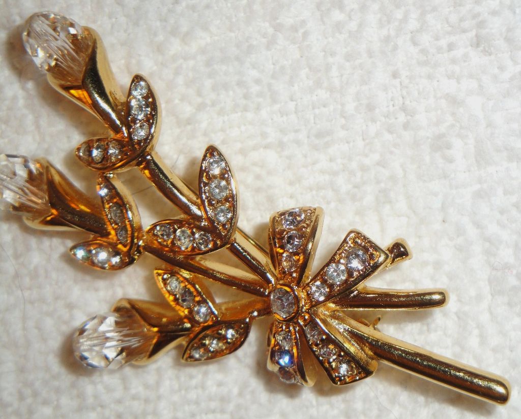 Vintage Signed Monet Bouquet of Crystal Flowers Brooch accented with pave leaves & a pave bow Vintage Signed Monet Bouquet of Crystal Flowers Brooch accented with pave leaves & a pave bow