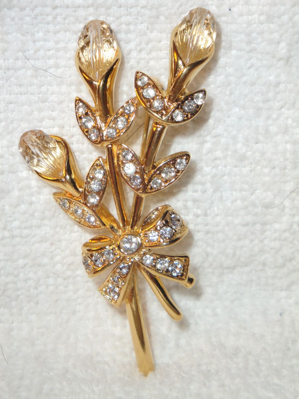 Vintage Signed Monet Bouquet of Crystal Flowers Brooch accented with pave leaves & a pave bow Vintage Signed Monet Bouquet of Crystal Flowers Brooch accented with pave leaves & a pave bow