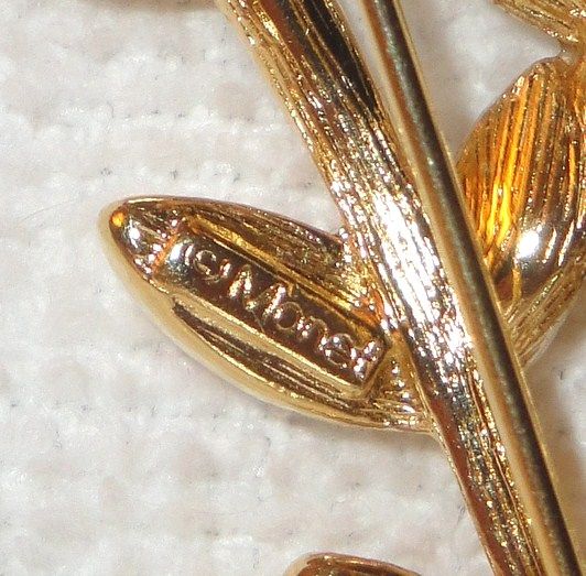 Vintage Signed Monet Bouquet of Crystal Flowers Brooch accented with pave leaves & a pave bow Vintage Signed Monet Bouquet of Crystal Flowers Brooch accented with pave leaves & a pave bow