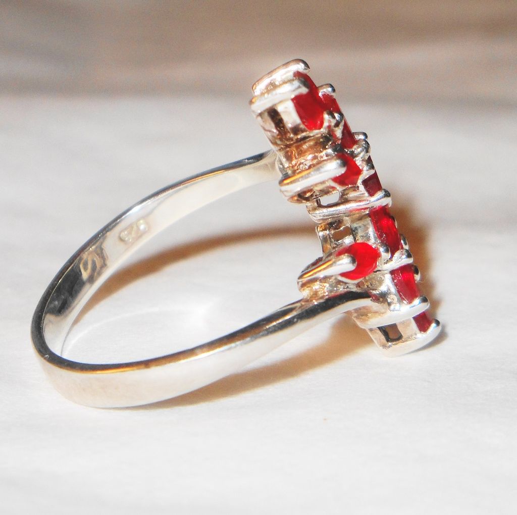 Avon 2004 "Sterling Silver Birthstone Bypass Ring ~ July" in size small (approximately size 5-6) Avon 2004 "Sterling Silver Birthstone Bypass Ring ~ July" in size small (approximately size 5-6)