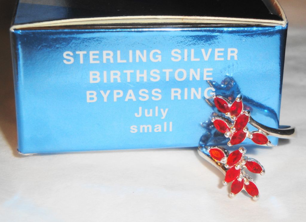 Avon 2004 "Sterling Silver Birthstone Bypass Ring ~ July" in size small (approximately size 5-6) Avon 2004 "Sterling Silver Birthstone Bypass Ring ~ July" in size small (approximately size 5-6)