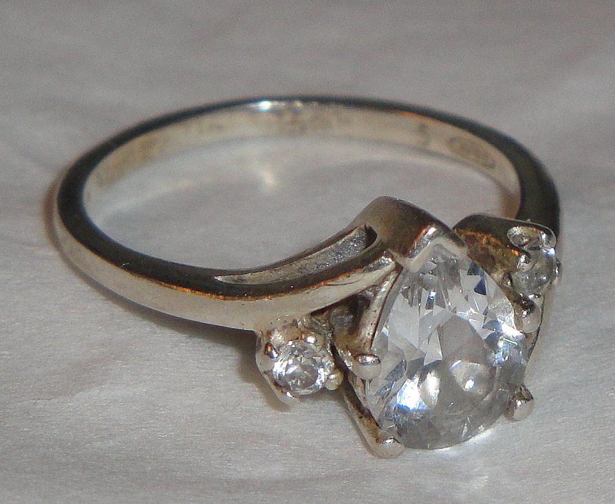 Signed Avon "Sterling Silver Pear Shaped CZ" ~ Size 5 ~ sterling silver with CZ pear shape & rhinestone accents Signed Avon "Sterling Silver Pear Shaped CZ" ~ Size 5 ~ sterling silver with CZ pear shape & rhinestone accents