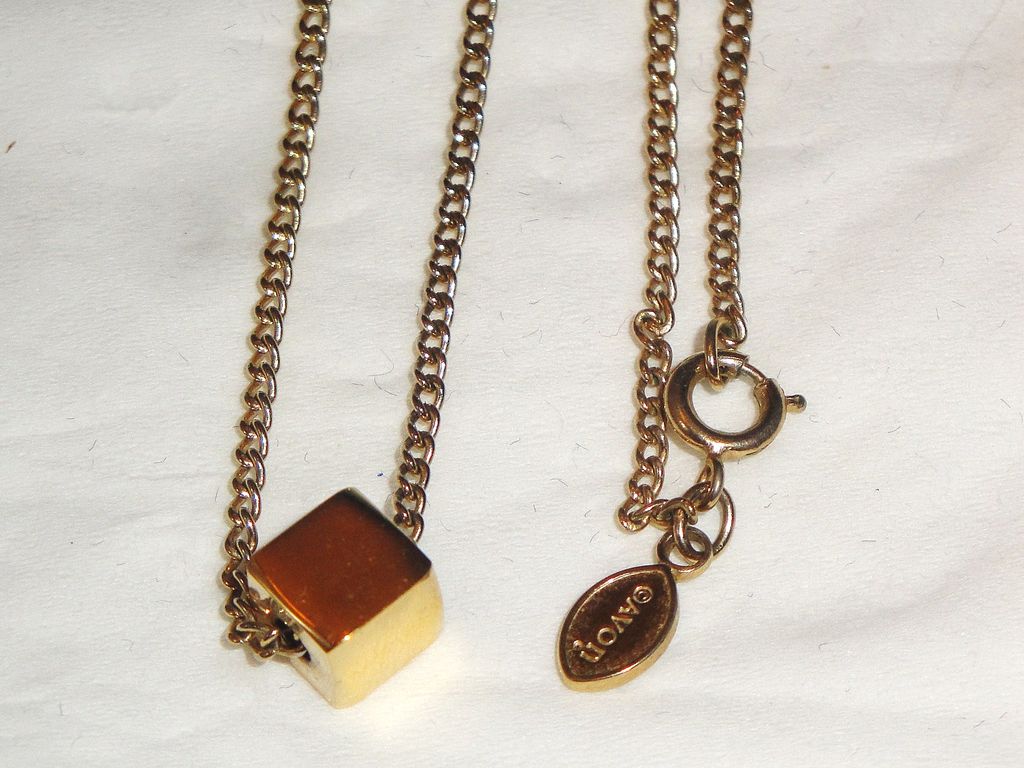 Vintage Signed Avon "The Single Cube" ~ versatile cube in gold-tone Vintage Signed Avon "The Single Cube" ~ versatile cube in gold-tone
