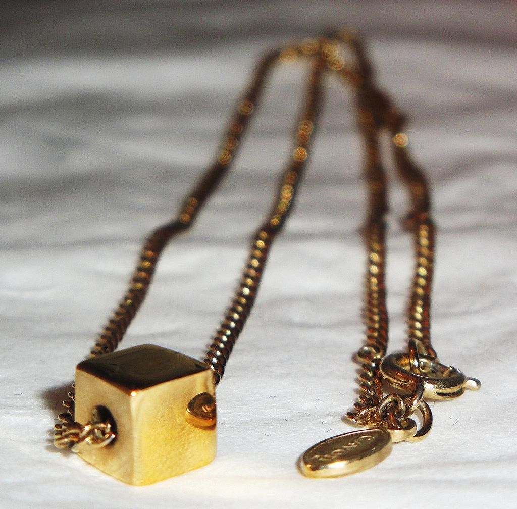 Vintage Signed Avon "The Single Cube" ~ versatile cube in gold-tone Vintage Signed Avon "The Single Cube" ~ versatile cube in gold-tone