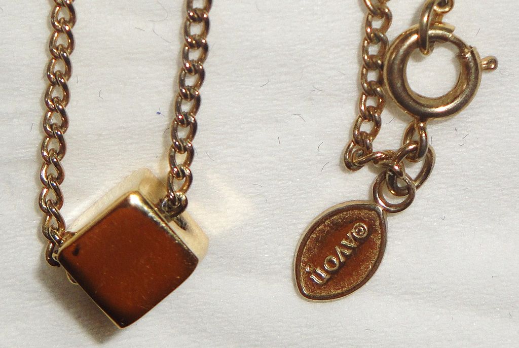Vintage Signed Avon "The Single Cube" ~ versatile cube in gold-tone Vintage Signed Avon "The Single Cube" ~ versatile cube in gold-tone