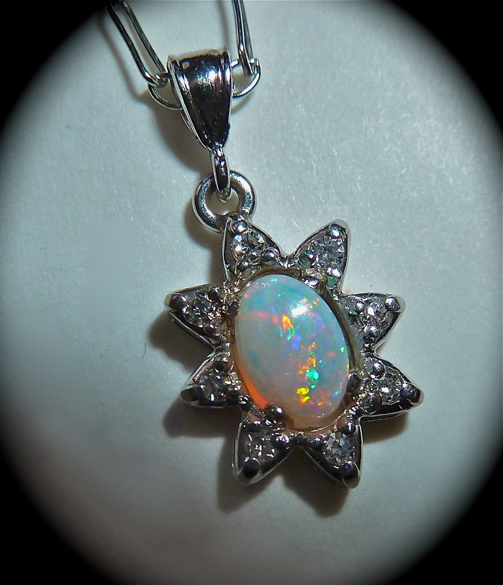 Opal & Diamond 14k White Gold Twinkling Star Pendant Opal & Diamond 14k White Gold Twinkling Star Pendant