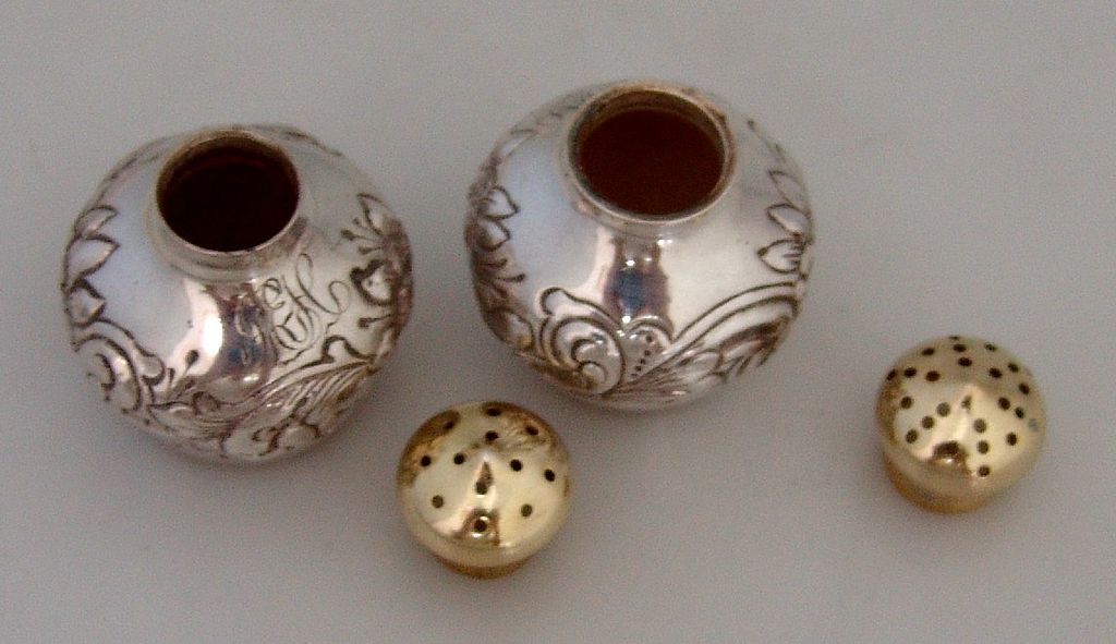 Salt & Pepper Shakers Floral Repousse George C .Shreve 1885 Sterling Silver Salt & Pepper Shakers Floral Repousse George C .Shreve 1885 Sterling Silver