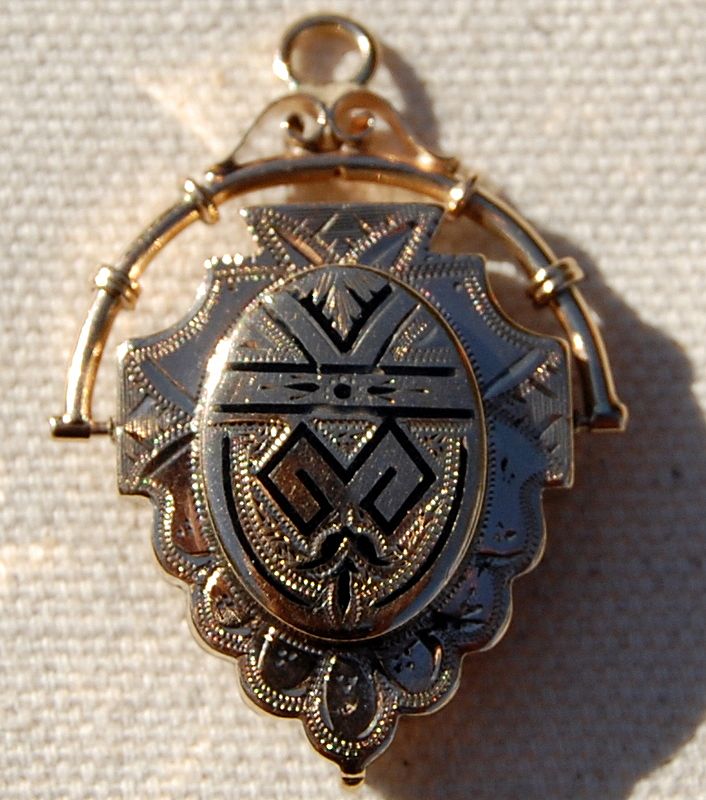 Beautiful Victorian 14K Gold & Black Enamel Shield Motif Swivel Locket Beautiful Victorian 14K Gold & Black Enamel Shield Motif Swivel Locket