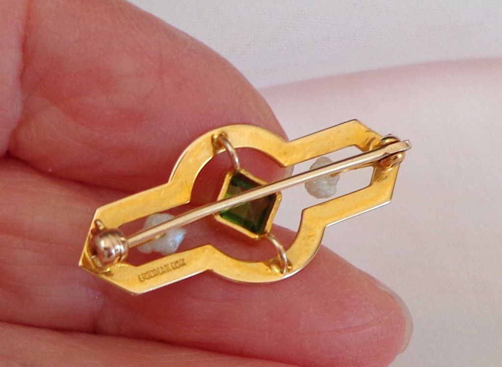 10K Gold Tiny Antique Doll / Baby Brooch with Baroque Pearls & Emerald Green Stone. Signed Godman. Perfect Condition. 10K Gold Tiny Antique Doll / Baby Brooch with Baroque Pearls & Emerald Green Stone. Signed Godman. Perfect Condition.
