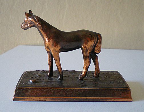 old metal horse figurines