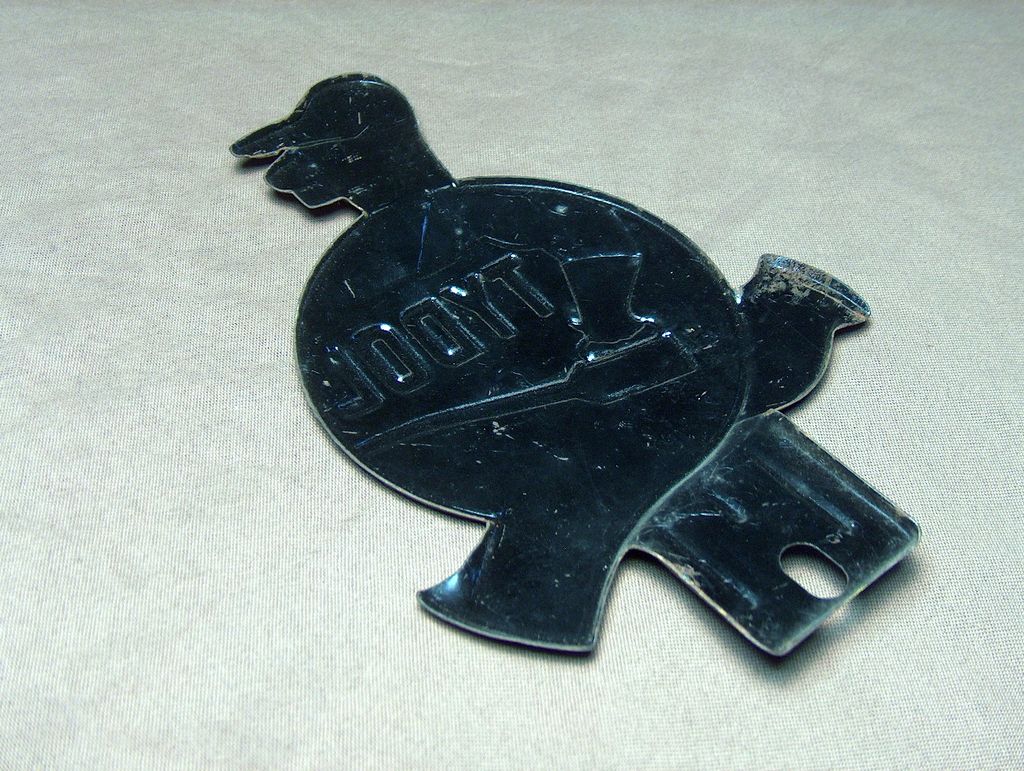 1930s "Tydol" Tin Litho License Topper. 1930s "Tydol" Tin Litho License Topper.