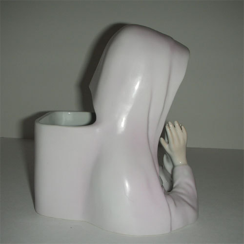 Praying nun head planter in pink habit Praying nun head planter in pink habit