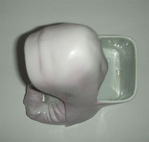 Praying nun head planter in pink habit Praying nun head planter in pink habit