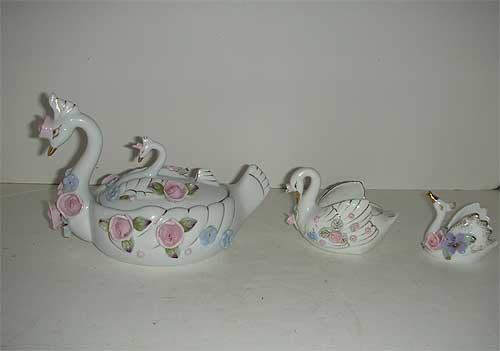 Swan covered dish and family w/ applied flowers Swan covered dish and family w/ applied flowers