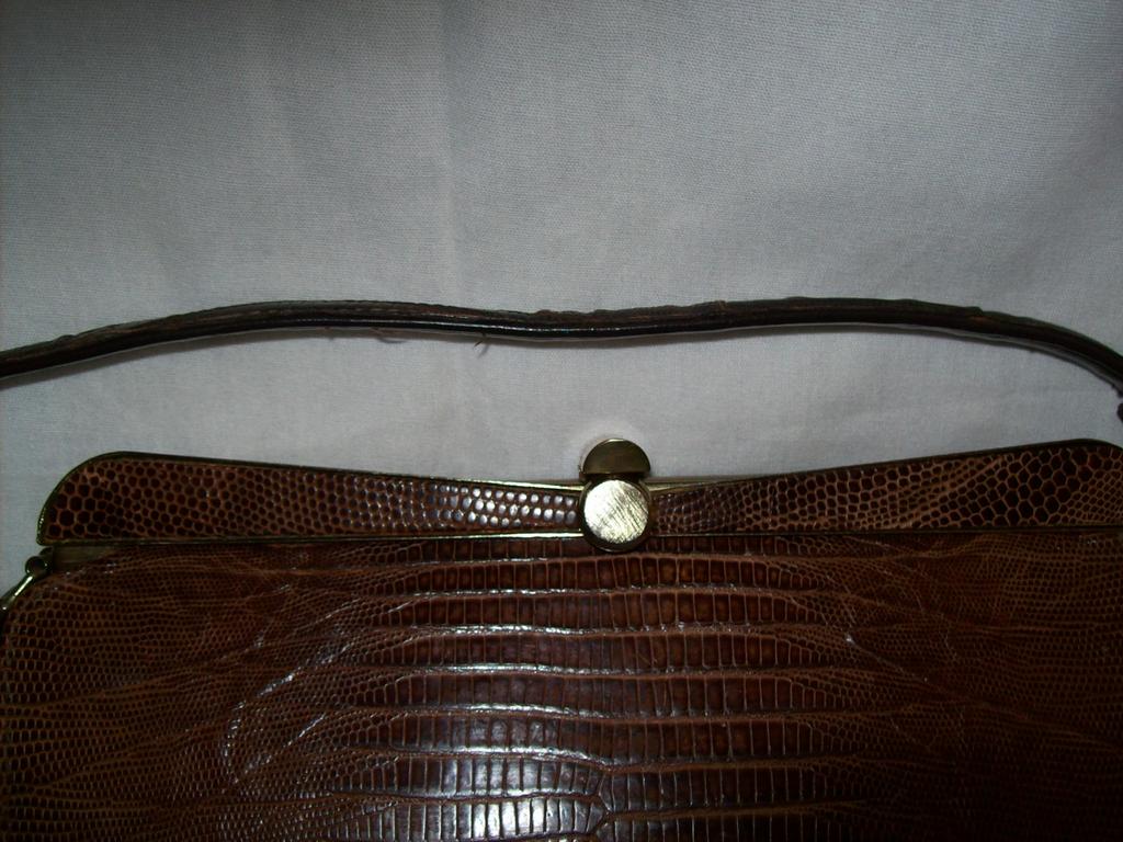 Item ID: 142 lizard bag In Shop's Backroom Item ID: 142 lizard bag In Shop's Backroom