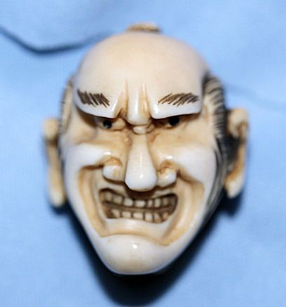 Ivory Netsuke of Angry Mans Face Ivory Netsuke of Angry Mans Face