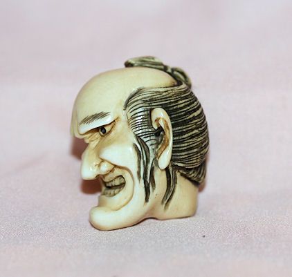 Ivory Netsuke of Angry Mans Face Ivory Netsuke of Angry Mans Face