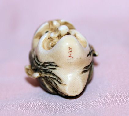 Ivory Netsuke of Angry Mans Face Ivory Netsuke of Angry Mans Face