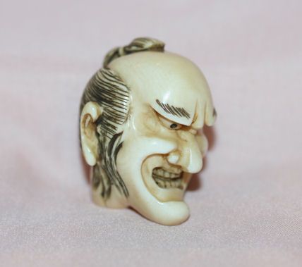 Ivory Netsuke of Angry Mans Face Ivory Netsuke of Angry Mans Face