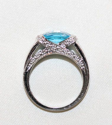 14 Karat White Gold & Cushion Cut Blue Topaz 14 Karat White Gold & Cushion Cut Blue Topaz