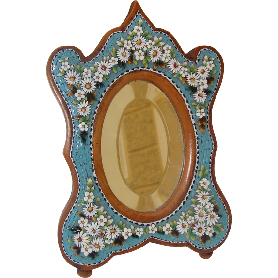 Antique Micromosaic mirror with daisies and green leaves on a turquoise ground Antique Micromosaic mirror with daisies and green leaves on a turquoise ground