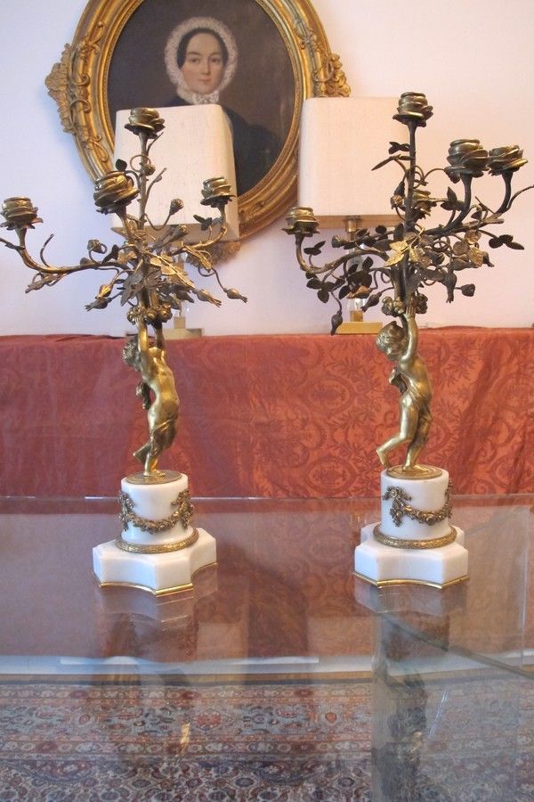 A pair of French Gilt Bronze five-light figural candelabra, 19th century A pair of French Gilt Bronze five-light figural candelabra, 19th century