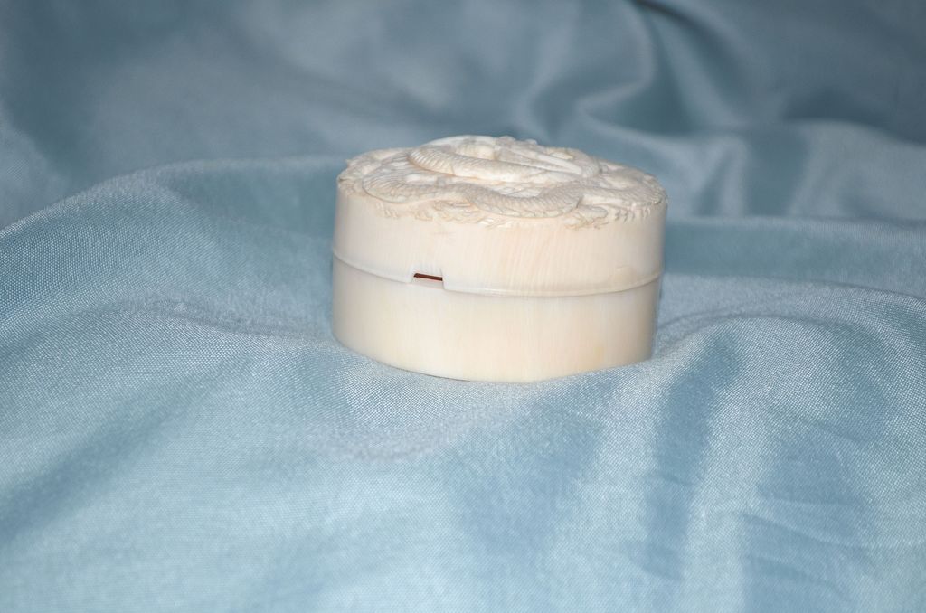 A Japanese Carved Ivory Circular Box A Japanese Carved Ivory Circular Box