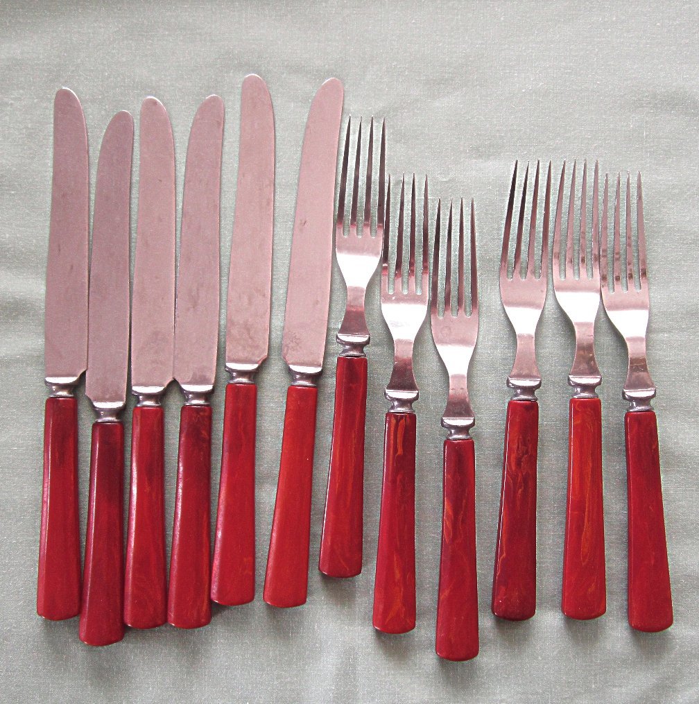 Vintage Red Butterscotch Marbled Flatware Twelve Pieces Vintage Red Butterscotch Marbled Flatware Twelve Pieces
