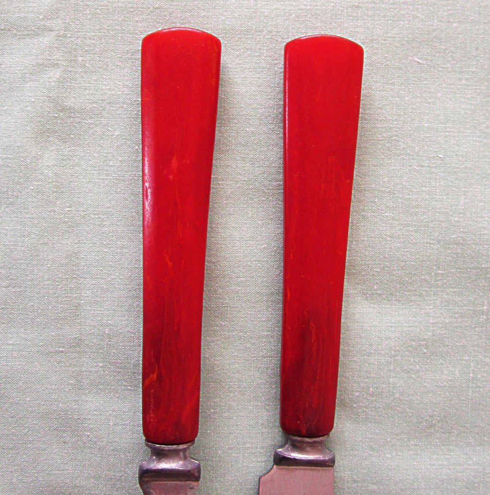 Vintage Red Butterscotch Marbled Flatware Twelve Pieces Vintage Red Butterscotch Marbled Flatware Twelve Pieces