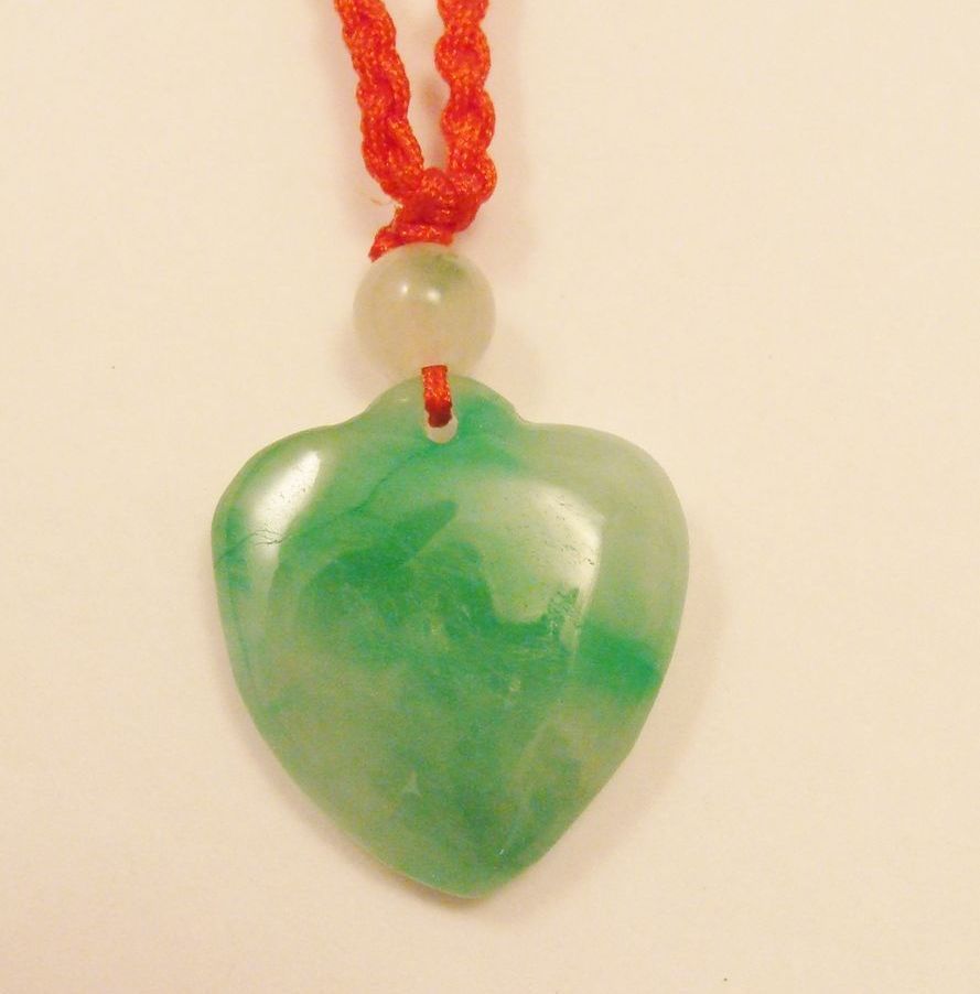 Delightful Carved Green Jade Heart & Bead on Red Satin Cord Necklace Delightful Carved Green Jade Heart & Bead on Red Satin Cord Necklace