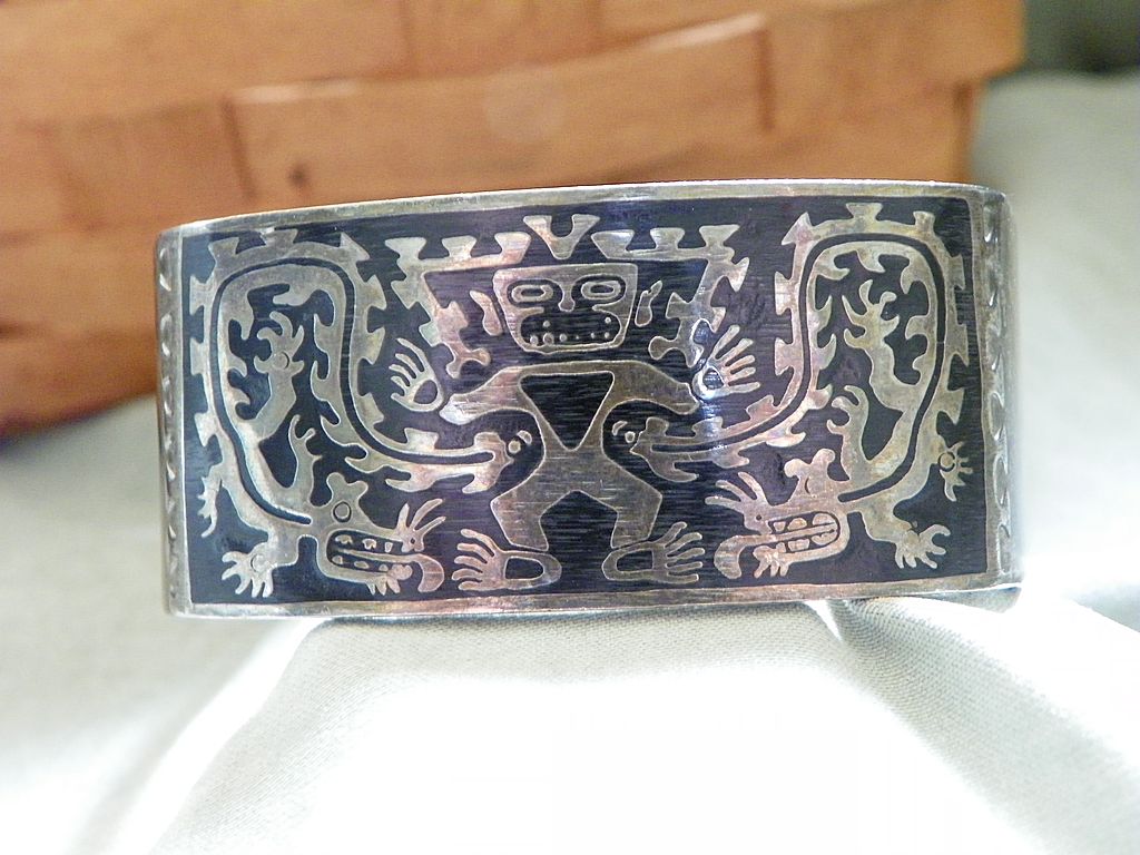 1" Heavy Sterling Silver Cuff Bracelet with Black Raised Enamel Aztec Design 1" Heavy Sterling Silver Cuff Bracelet with Black Raised Enamel Aztec Design