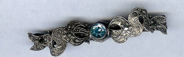 Silver Tone Marcasite Bow Pin With Blue Stone Silver Tone Marcasite Bow Pin With Blue Stone