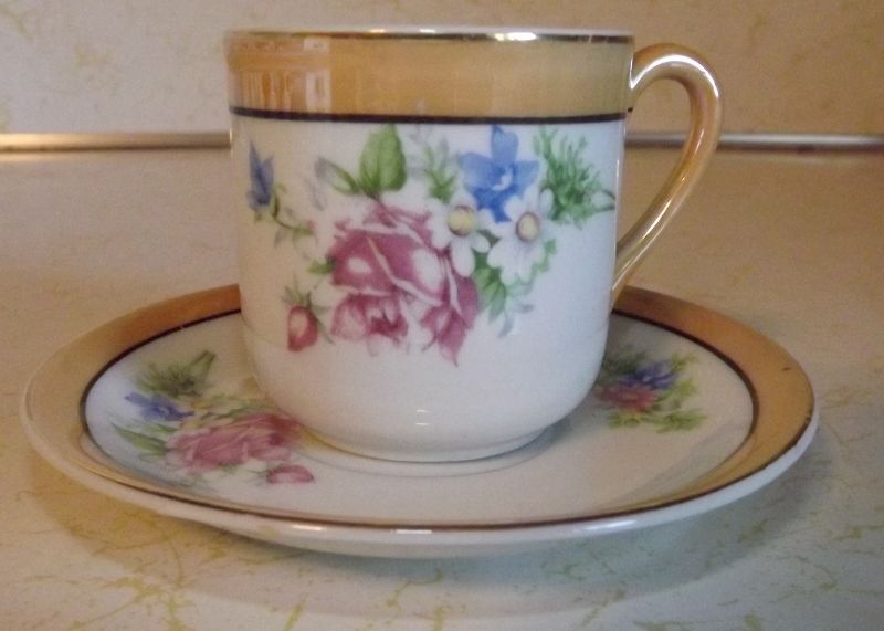 Coffee cup and saucer demitasse Made in Occupied Japan with flower motif Coffee cup and saucer demitasse Made in Occupied Japan with flower motif