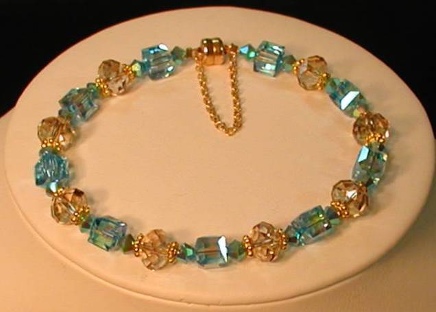 Turquoise & Gold Swarovski Crystal Bracelet with Magnetized Clasp and Safety Chain Turquoise & Gold Swarovski Crystal Bracelet with Magnetized Clasp and Safety Chain