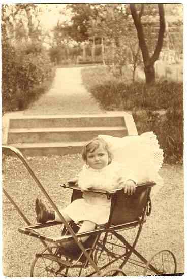 Ca. 1915: Two vintage photos of a Girl in a Pram Ca. 1915: Two vintage photos of a Girl in a Pram