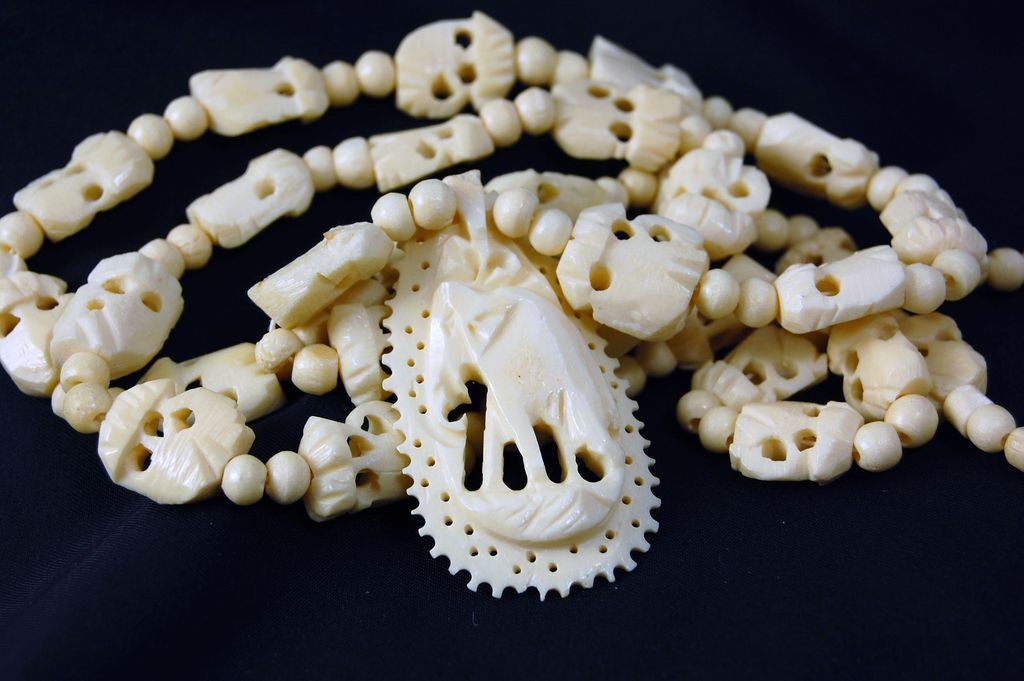 Vintage faux ivory plastic long pendant necklace elephant 32" Vintage faux ivory plastic long pendant necklace elephant 32"