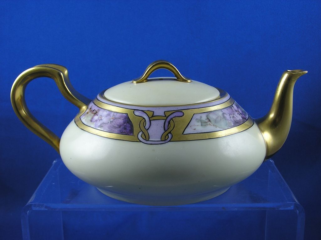 Haviland Limoges Arts & Crafts Violet Motif Teapot, Creamer & Sugar Set (Signed "Edna S. Arthur San Francisco"/Dated 1920) Haviland Limoges Arts & Crafts Violet Motif Teapot, Creamer & Sugar Set (Signed "Edna S. Arthur San Francisco"/Dated 1920)