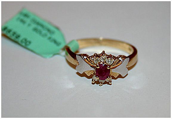 14K gold ruby and diamond ring New, old stock 14K gold ruby and diamond ring New, old stock