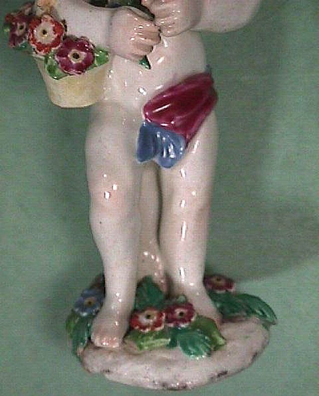 1760s (or older) English Soft Paste Porcelain 5 inch Figurine on plain base (Spring Putto) 1760s (or older) English Soft Paste Porcelain 5 inch Figurine on plain base (Spring Putto)