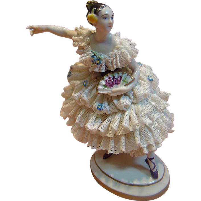 German Dresden Porcelain Figurine of Lady with Fan and Comb in her Hair German Dresden Porcelain Figurine of Lady with Fan and Comb in her Hair
