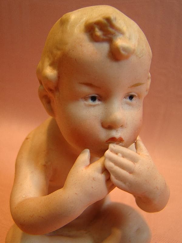 4-1/2 Inch Seated Gebruder Heubach Nude Kiss Throwing Piano Baby 4-1/2 Inch Seated Gebruder Heubach Nude Kiss Throwing Piano Baby
