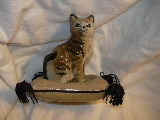 Old Ceramic Cat on a fringed Paper Mache Pillow Fine Statue or Figurine Old Ceramic Cat on a fringed Paper Mache Pillow Fine Statue or Figurine