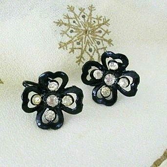 Molded Black Plastic Flowers With Rhinestone Centers Molded Black Plastic Flowers With Rhinestone Centers