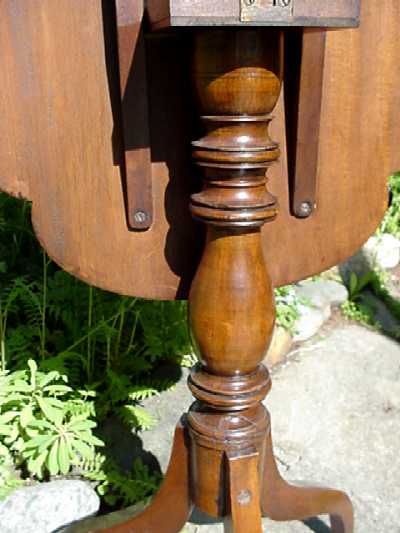 American Candle Stand in Walnut a Tilt Top Table with Spider Legs American Candle Stand in Walnut a Tilt Top Table with Spider Legs