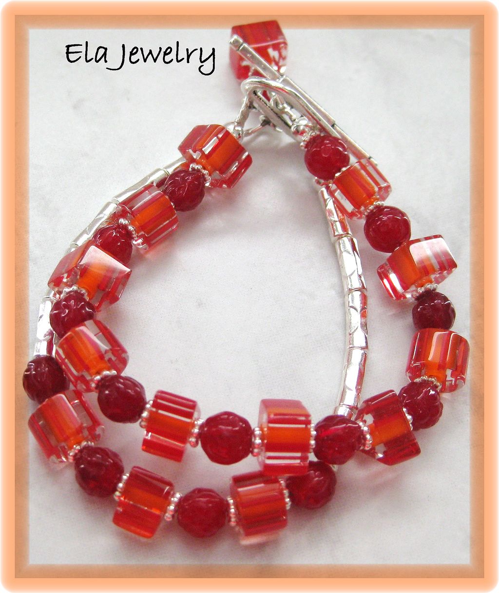 Two Strand Bracelet in Reds and Oranges Two Strand Bracelet in Reds and Oranges