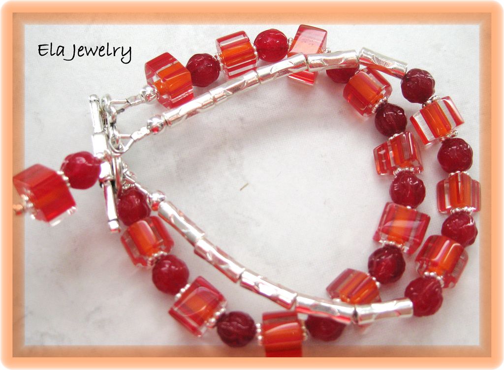 Two Strand Bracelet in Reds and Oranges Two Strand Bracelet in Reds and Oranges