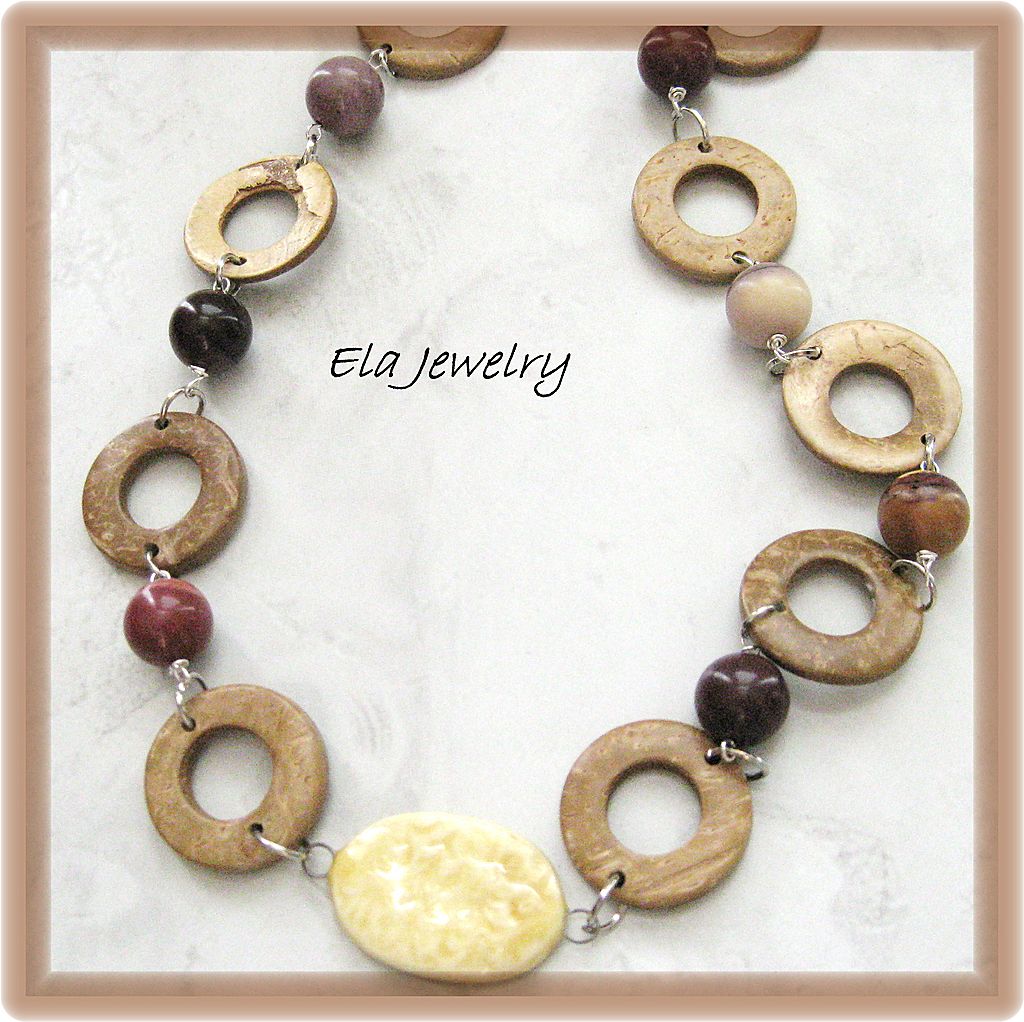 Long Necklace Featuring Wood, Porcelain, and Moukaite Gemstones Long Necklace Featuring Wood, Porcelain, and Moukaite Gemstones