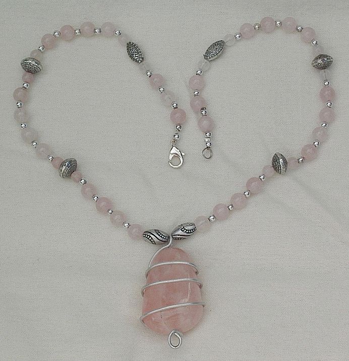 Pink Quartz and Silver-Tone Pendant Necklace. Pink Quartz and Silver-Tone Pendant Necklace.