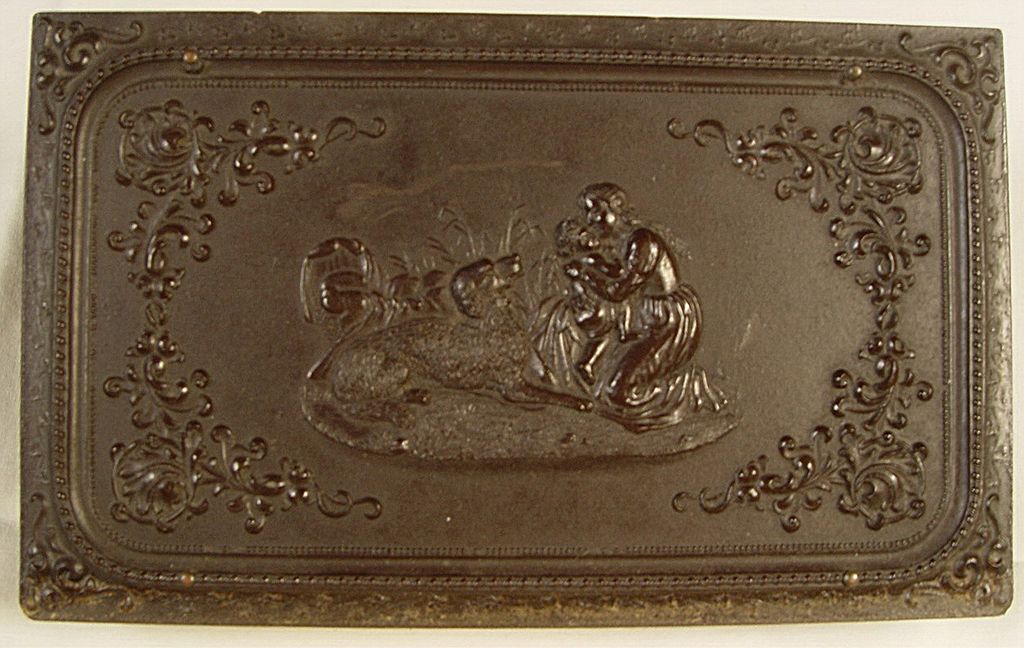 Four Ruby Ambrotype Portraits in one Large Gutta Percha Case Four Ruby Ambrotype Portraits in one Large Gutta Percha Case