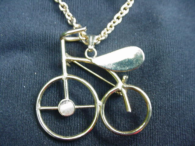 Vintage Goldtone Bicycle Pin or Pendant and Chain Vintage Goldtone Bicycle Pin or Pendant and Chain